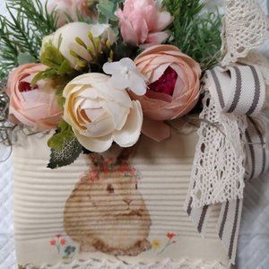 Tin can pocket with spring floral arrangement